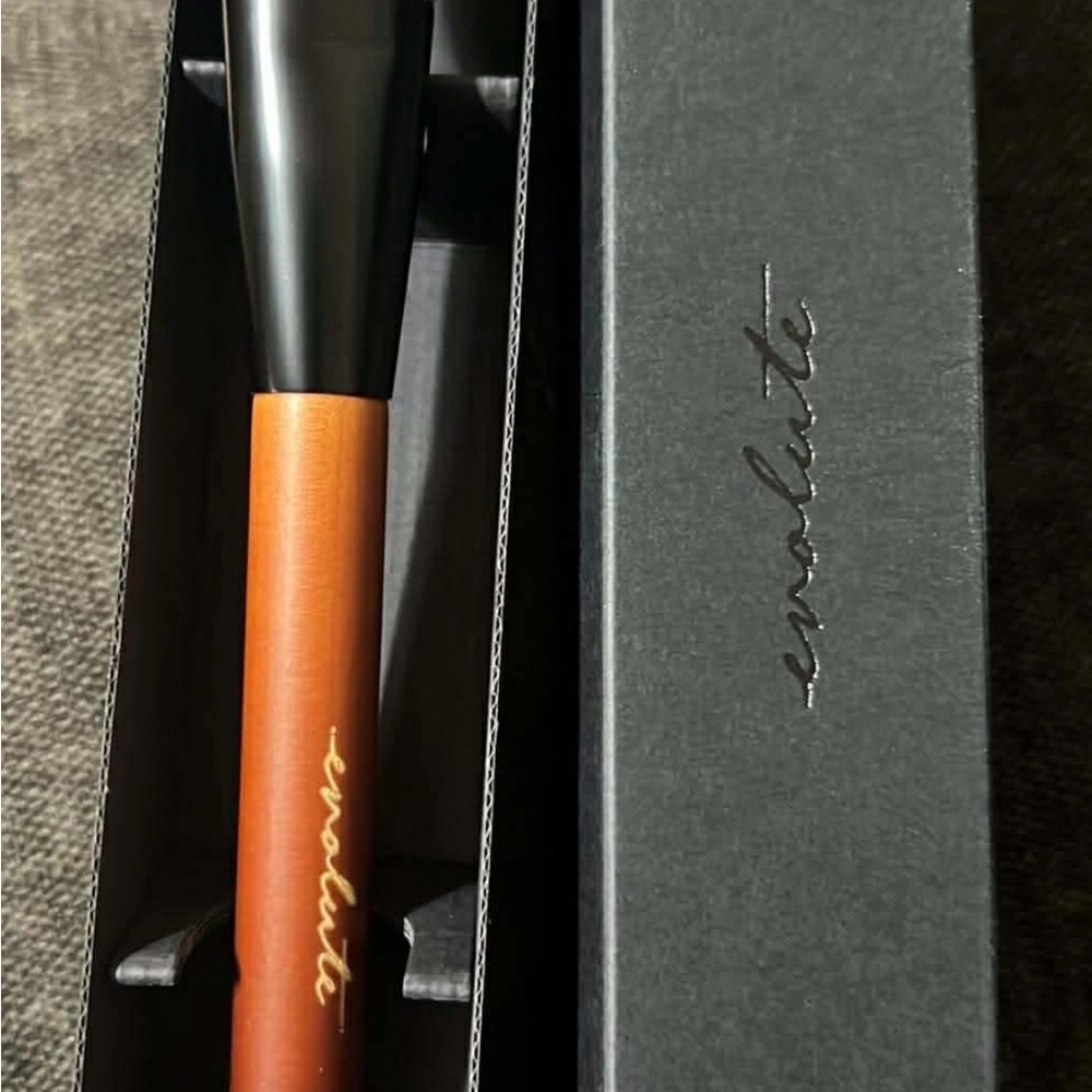 Evolute Black and Orange Brush